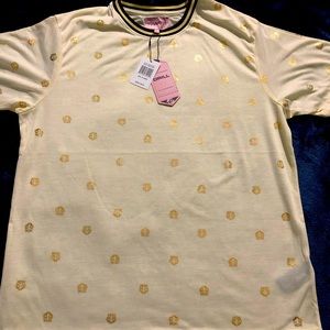 Cream colored shirt with gold tiger figures